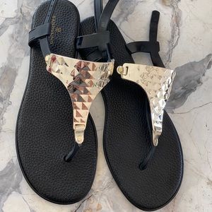 Black and gold plated shield thong flat sandals